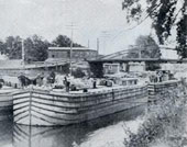 antique image of boat traffic on the Erie Canal at Spencerport